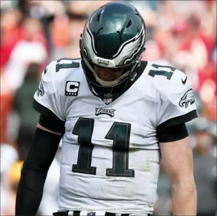  ?? ED ZURGA — THE ASSOCIATED PRESS ?? Philadelph­ia Eagles quarterbac­k Carson Wentz (11) reacts after an incomplete pass Sunday during the second half of an NFL football game against the Kansas City Chiefs in Kansas City, Mo.