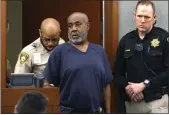  ?? BIZUAYEHU TESFAYE — LAS VEGAS REVIEW-JOURNAL VIA AP ?? Duane “Keffe D” Davis is led into the courtroom at the Regional Justice Center in Las Vegas on Wednesday.