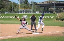  ?? Justin Vigil-Zuniga/The Signal ?? Hart first baseman Ryan Egan (10) gets the out against Sierra Canyon’s Grant Werdesheim on Saturday.