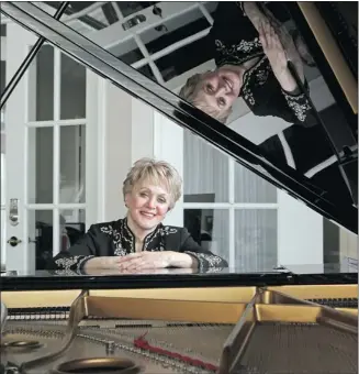  ?? Colleen De Neve/calgary Herald ?? Irene Besse is closing her well-known piano business after 40 years in Calgary.