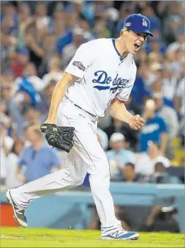  ?? Robert Gauthier Los Angeles Times ?? STARTER Rich Hill allowed two hits in six shutout innings. The last of his six strikeouts, against Anthony Rizzo, ended the sixth and elicited a celebratio­n.