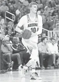  ?? STEPHEN R. SYLVANIE, USA TODAY SPORTS ?? Arizona played through a shooting slump by Lauri Markkanen and enters the NCAA tournament 30-4.