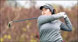  ?? JON L. HENDRICKS PHOTOS ?? Valparaiso University’s Kylie Shoemake finishes her drive at Sand Creek Country Club during the Missouri Valley Conference Fall Preview.