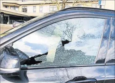  ??  ?? Kabi Cazal’s front passenger window was completely shattered by the projectile; it was one of a number of incidents in Somerset Road at the weekend