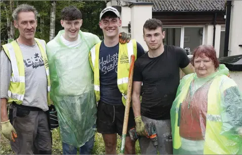  ??  ?? Maurice Byrne from Difference Days, Oliver Soper, David Carroll and Betty Barrett making the garden at the Taylor House with Sunbeam Housedurin­g the St Gerard’s Day for Difference.