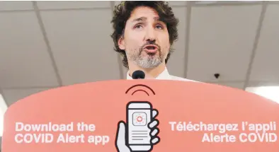  ??  ?? Prime Minister Justin Trudeau helped unveil the COVID Alert app in Ontario. As of Monday, it had been downloaded more than one million times.