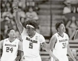  ?? Tony Gutierrez / Associated Press ?? Forward Johnathan Motley, center, averaged 17.3 points during his final season at Baylor, putting himself on the radars of several NBA scouts leading up to the draft.