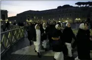  ?? AP PHOTO/GREGORIO BORGIA ?? Nuns arrive at dawn to view the body of Pope Emeritus Benedict XVI as it lies in state in St. Peter’s Basilica at the Vatican, Wednesday, Jan. 4, 2023. The Vatican announced that Pope Benedict died on Dec. 31, 2022, aged 95, and that his funeral will be held on Thursday, Jan. 5, 2023.