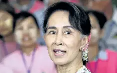  ?? THE ASSOCIATED PRESS FILES ?? Myanmar’s State Counsellor Aung San Suu Kyi in June in Naypyitaw, Myanmar. Suu Kyi must publicly condemn the atrocities being committed against Rohingya Muslims in Myanmar, Prime Minister Justin Trudeau says.