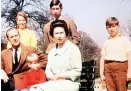  ??  ?? Clockwise from left: A portrait with the Queen for the Golden Jubilee; on Coronation Day in 1953 and with the Queen and their four children in 1970