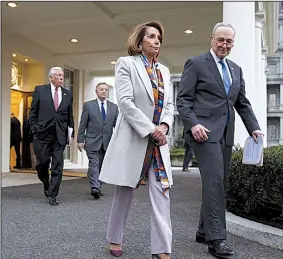  ?? AP/EVAN VUCCI ?? House Democratic leader Nancy Pelosi and Senate Minority Leader Charles Schumer leave the White House after a meeting Wednesday with President Donald Trump. “We have given the Republican­s a chance to take ‘yes’ for an answer,” Pelosi said after the meeting. Schumer said Trump “could not give a good answer” for why the shutdown should continue.