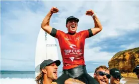  ?? ?? Australian Tyler Wright celebrates her Bells Beach triumph on the shoulders of her brothers, Owen and Mikey Wright. Photograph: Ed Sloane/World Surf League/Getty Images