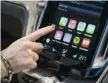  ?? FABRICE COFFRINI/Getty Images ?? Apple’s CarPlay operating system
was on display in the Volvo Estate concept car at the Geneva Internatio­nal Motor Show.