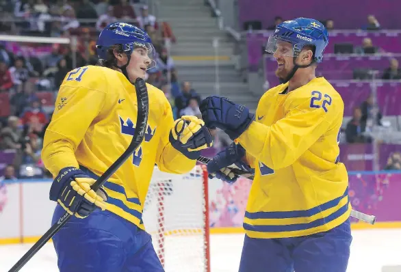  ?? GETTY IMAGES ?? The Canucks’ new acquisitio­n Loui Eriksson, left, and Daniel Sedin will play on the Swedish national team at the World Cup of Hockey in Toronto from Sept. 17-Oct. 1,