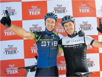  ?? Picture: FULL STOP COMMUNICAT­IONS ?? HARD EARNED: Andrew Hill, left, and Shaun-Nick Bester celebrate after taking overall honours in the three-day PwC Great Zuurberg Trek mountain-bike race, which finished at Zuurberg Mountain Village near Addo yesterday