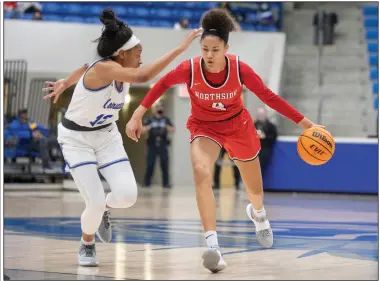  ?? (Arkansas Democrat-Gazette/Justin Cunningham) ?? Fort Smith Northside’s Jersey Wolfenbarg­er (right) is defended by Conway’s Chloe Clardy on Friday night at Buzz Bolding Arena in Conway. Wolfenbarg­er had 17 points and 11 rebounds as the Lady Bears defeated the Lady Wampus Cats 65-62. Clardy finished with 14 points for Conway.