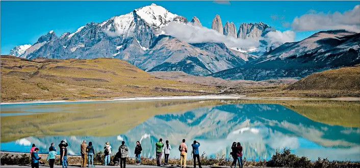  ?? MARTIN BERNETTI/GETTY-AFP 2016 ?? Turquoise lakes, granite pillars and glaciers add to the stunning scenery of Torres del Paine National Park, a hiking paradise.