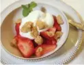  ??  ?? This rosewater cream dessert has a topping of crushed amaretti cookies.