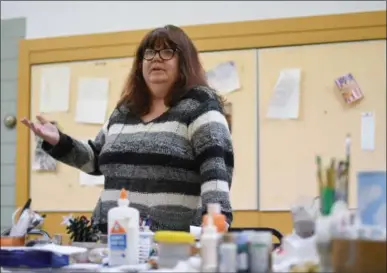  ?? ERIC BONZAR — THE MORNING JOURNAL ?? Secretary-Treasurer Jeanne Stevens talks about the benefits of the Lorain Community Seniors Inc. craft room during a walk through of the facility March 27.