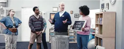  ?? Progressiv­e ?? In a scene from a recent Progressiv­e commercial, Dr. Rick (Bill Glass) quizzes his students on whether one really needs a sign in the house that says “Live, Laugh, Love.” (Answer: One doesn’t, unless the goal is to become one’s parents.)