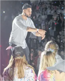  ??  ?? Wali Shah, Canadian spoken word artist, poet, musician and philanthro­pist, was at WE Day Atlantic Oct. 16 in Halifax. He speaks on various topics like bullying, mental health, and social change.