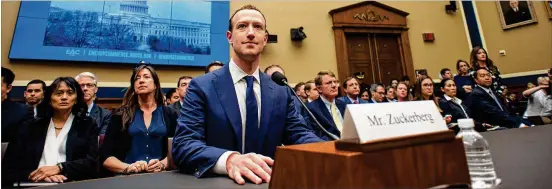  ??  ?? Facebook CEO Mark Zuckerberg, testifying before a House panel Wednesday, said he made a “huge mistake” in not protecting users in the Cambridge Analytica case.