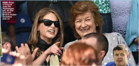  ??  ?? fizz: Brian O’Driscoll pops the champagne, left, as wife Amy and Brian’s mother Geraldine look on