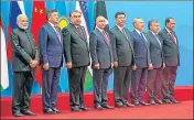  ?? AP ?? ■ Prime Minister Narendra Modi with other leaders of SCO member countries in Qingdao on Sunday.