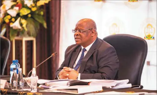  ?? Photos: OJ Koloti/gallo Images and Phill Magakoe/afp ?? JSC Chair, Raymond Zondo (above) invited senior advocates and academics to act at the court, and later avail themselves for appointmen­t. The JSC must recommend four candidates to President Cyril Ramaphosa (below).