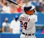  ?? Vaughn Ridley / Getty Images ?? Miguel Cabrera of the Detroit Tigers hits his 500th career home run in the sixth inning on Sunday.