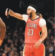  ?? Seth Wenig / Associated Press ?? Anthony Davis is stoked during his 48-point, 17-rebound performanc­e. His team came back from down 19 points.
