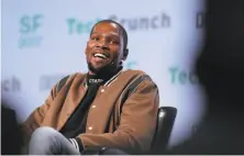  ?? Michael Macor / The Chronicle ?? The Warriors’ Kevin Durant faced questions about his Twitter account when he appeared at TechCrunch Disrupt SF.