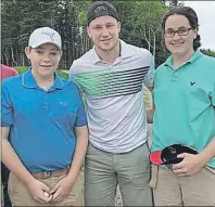  ?? SUBMITTED BY SHEILA CAVERZAN ?? Daniel Dellorusso, left, and Nick Caverzan flank Nathan MacKinnon after the Colorado Avalanche player finished a round with Sidney Crosby at the Seaview Golf Club in North Sydney. The local lads made a special trip to the Northside after hearing that...