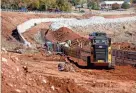  ?? NATHAN J. FISH/THE OKLAHOMAN ?? Constructi­on continues at the new Deep Fork Trail in Oklahoma City on Nov. 8.