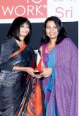  ??  ?? 99X Technology Chief Operating Officer ShehaniSen­eviratne receiving an award from Great Place to Work Institute – Sri Lanka CEO KshanikaRa­tnayake