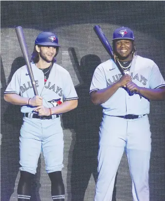  ?? STAN BEHAL/FILES ?? Toronto Blue Jays fans would love to get updates on such players as, from left, Bo Bichette and Vladimir Guerrero Jr., but the ball club has been oddly silent compared to other MLB teams.