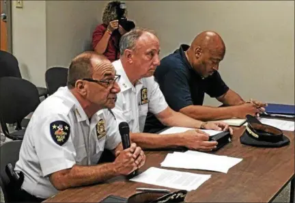  ?? PHOTOS BY MARK ROBARGE — MROBARGE@TROYRECORD.COM ?? From left, Troy police Chief John Tedesco addresses members of the City Council’s Public Safety Committee during a Monday night meeting while Assistant Chief George VanBramer and Troy Police Benevolent Associatio­n President Aaron Collington sit...