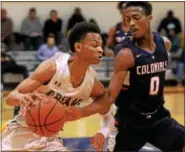  ?? BOB RAINES — DIGITAL FIRST MEDIA ?? Plymouth Whitemarsh’s Ish Horn tries to steal the ball as Bonner-Prendergas­t’s Isaiah Wong drives for the basket.