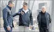  ?? EVAN VUCCI/AP 2018 ?? Gavin Newsom, left, and President Trump tour the aftermath of the fire Nov. 17.