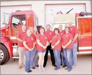  ?? RACHEL DICKERSON/MCDONALD COUNTY PRESS ?? Members of the Pineville Fire Department include Becky Ernest (front, left), RaeLynne Drake, Lori Byrd, Kimberly Bell, Gregg Sweeten (back, left), Kalee Sweeten, Chief Ryan Drake, Jacob Leake and Lt. Travis Bell.