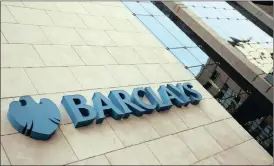  ?? PHOTO: REUTERS ?? Barclays towers in Johannesbu­rg. Barclays is seeking to sell down its remaining 50.1 percent stake in its African business to less than 20 percent.