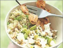  ?? AP PHOTO ?? Quinoa shrimp salad with avocado and pomegranat­e molasses features ingredient­s that pack big, bold and filling flavor, without requiring a whole lot of time or labour.