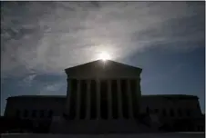  ?? AP FILE PHOTO/ANDREW HARNIK ?? This May 4 file photo shows the Supreme Court building in Washington.