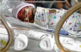 ??  ?? Grayson was born three months premature and weighing 3 pounds. The March of Dimes-Woman’s Hospital partnershi­p is in its 10th year.
