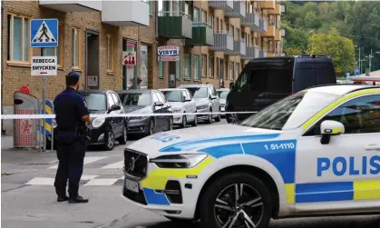  ?? ?? Police at the site of one of two explosions in Gothenburg. Photograph: Adam Ihse/TT News Agency/AFP/Getty Images dentialbui­ldings.