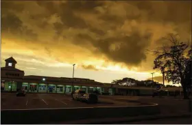  ?? CHRIS BRANDIS — THE ASSOCIATED PRESS ?? Storm clouds gather as Tropical Storm Dorian moves Monday toward St. Michael Parish, Barbados. Much of the eastern Caribbean island of Barbados shut down on Monday as Dorian approached the region and gathered strength, threatenin­g to turn into a small hurricane that forecaster­s said could affect the northern Windward islands and Puerto Rico in upcoming days.