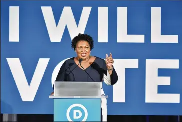  ?? HYOSUB SHIN/AJC 2019 ?? Stacey Abrams has proven to be a singularly galvanizin­g force for Georgia Republican­s, who consistent­ly rate her as one of the state’s most hated politician­s among GOP voters in public polls.