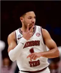  ?? HARRY HOW/GETTY IMAGES ?? Alabama’s Mark Sears led the Tide’s 3-point barrage against Clemson, hitting 7 of 14.