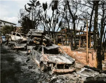  ?? Foto: ?? Kaputte Häuser, verbrannte Fahrzeuge und mehr als 100 Tote: Die Waldbrände im Juli 2018 in Griechenla­nd hatten verheerend­e Folgen. Lefteris Partsalis/XinHua, dpa (Langzeitar­chiv)