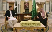  ?? — AFP ?? Saudi King Salman meets with Pakistan’s Prime Minister Imran Khan during a meeting in Riyadh on Tuesday.